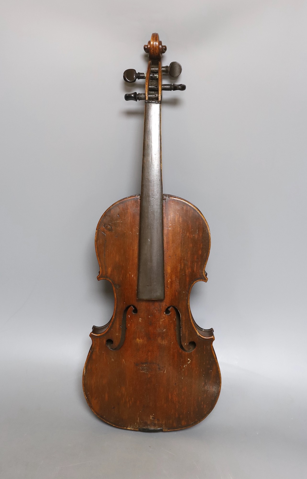 A European violin, circa 19th century, 59 cms long.